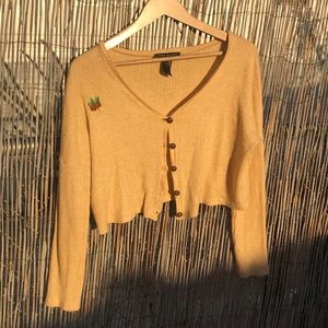 Yellow cardigan with detail